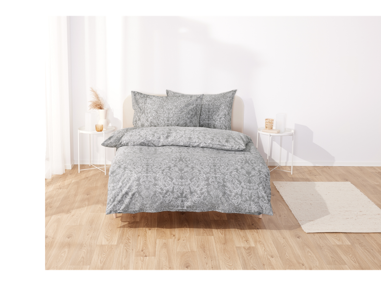 Light grey damask patterned bedding set.