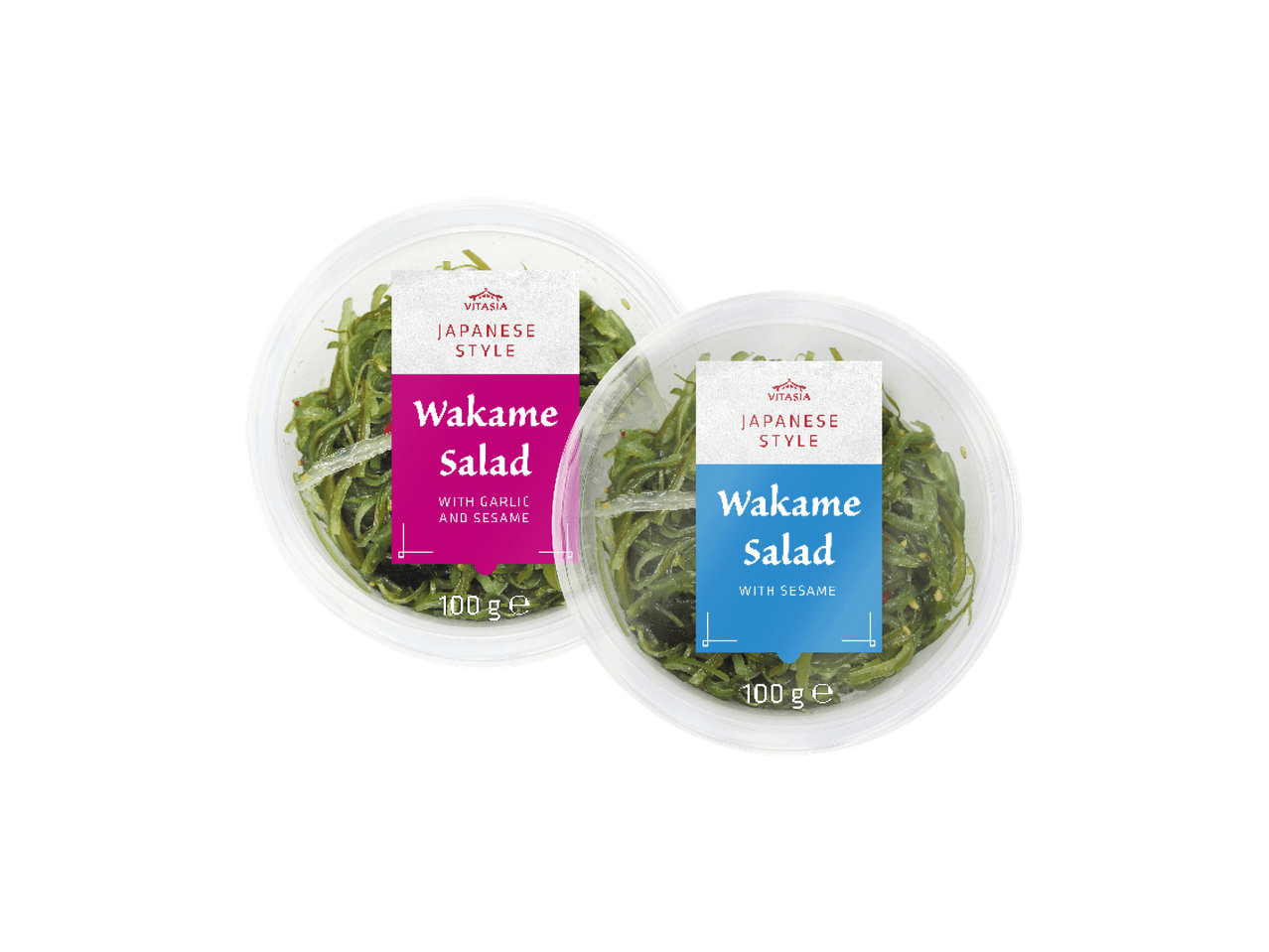 Dve posude japanske salate od wakame algi, jedna sa belim lukom i susamom, druga sa susamom.