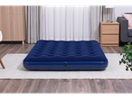 Blue inflatable mattress in a room.