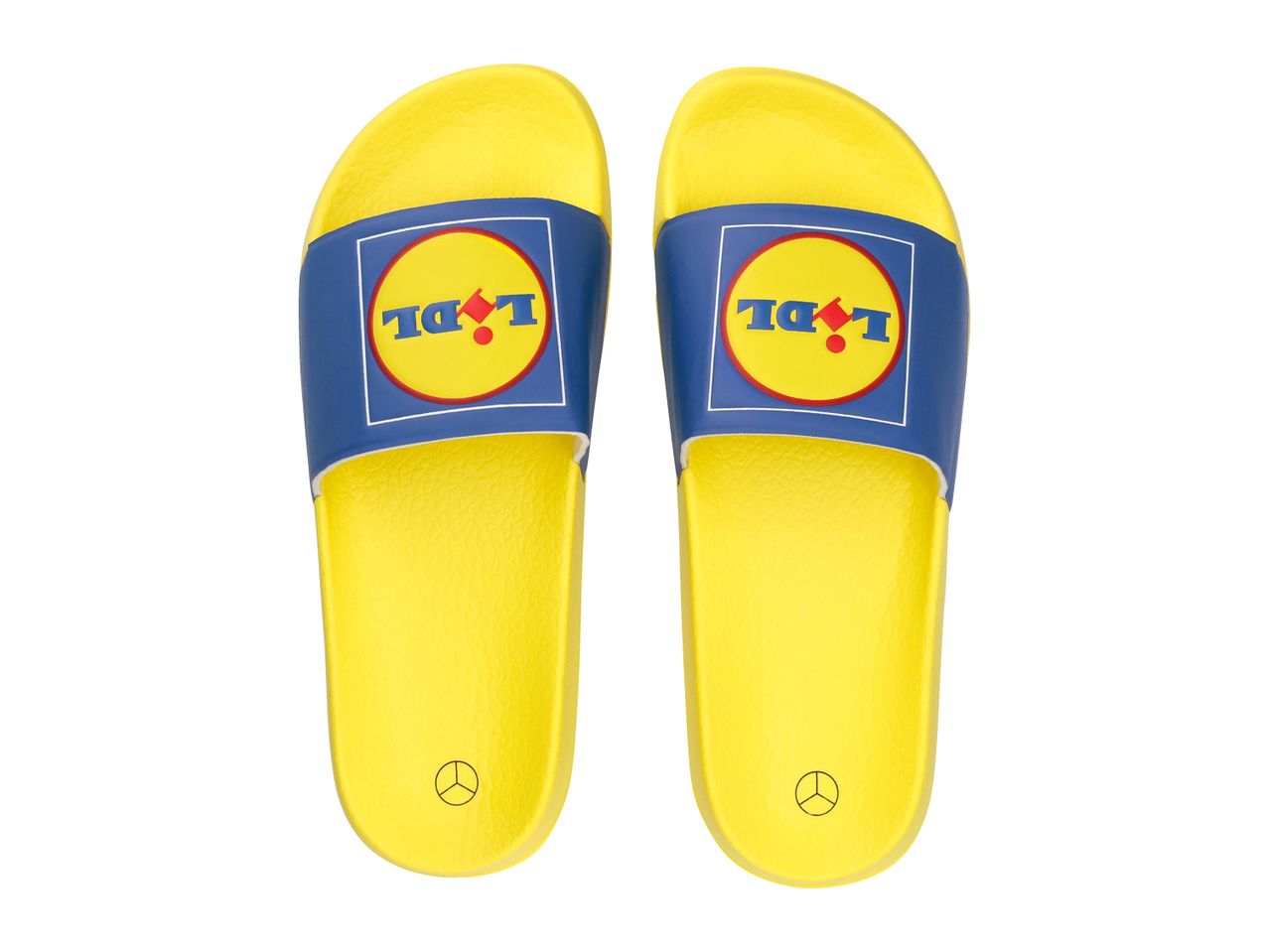 Pair of yellow and blue slide sandals with a circular logo on the strap.