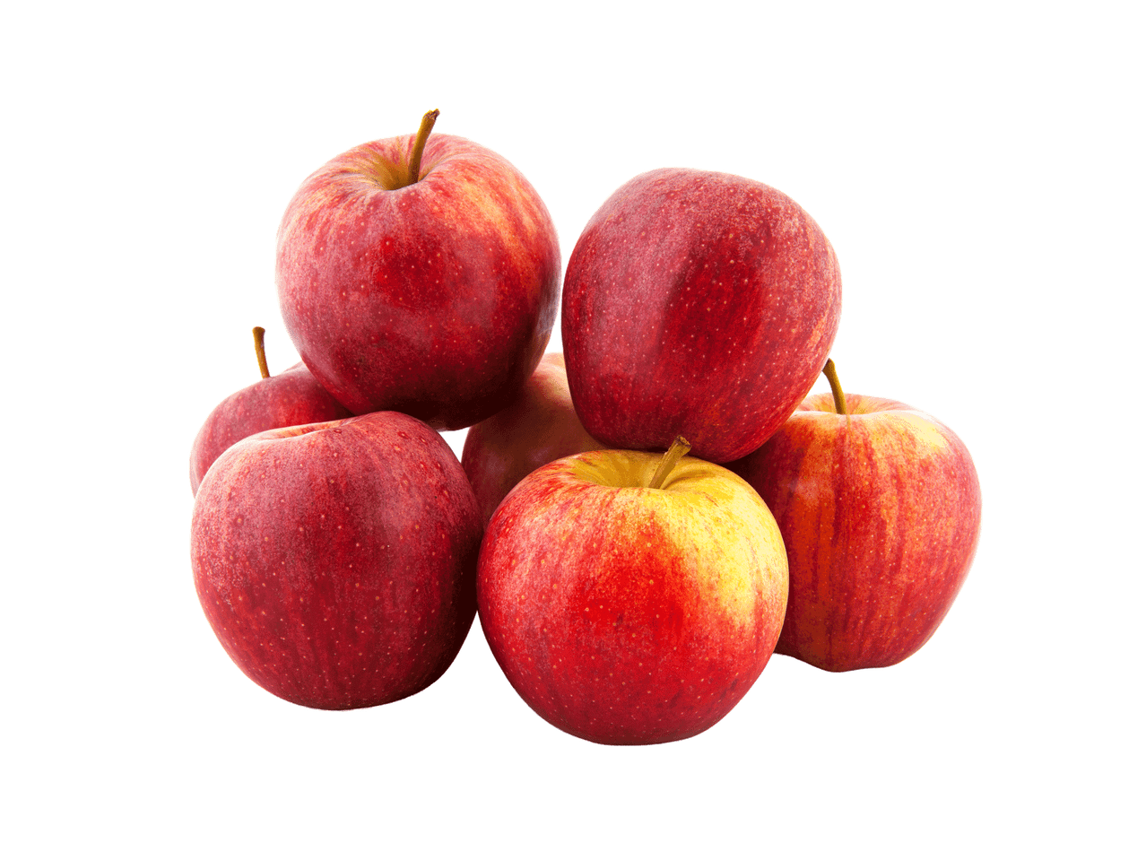 Kuhjatud punased ja kollased õunad mustal taustal.