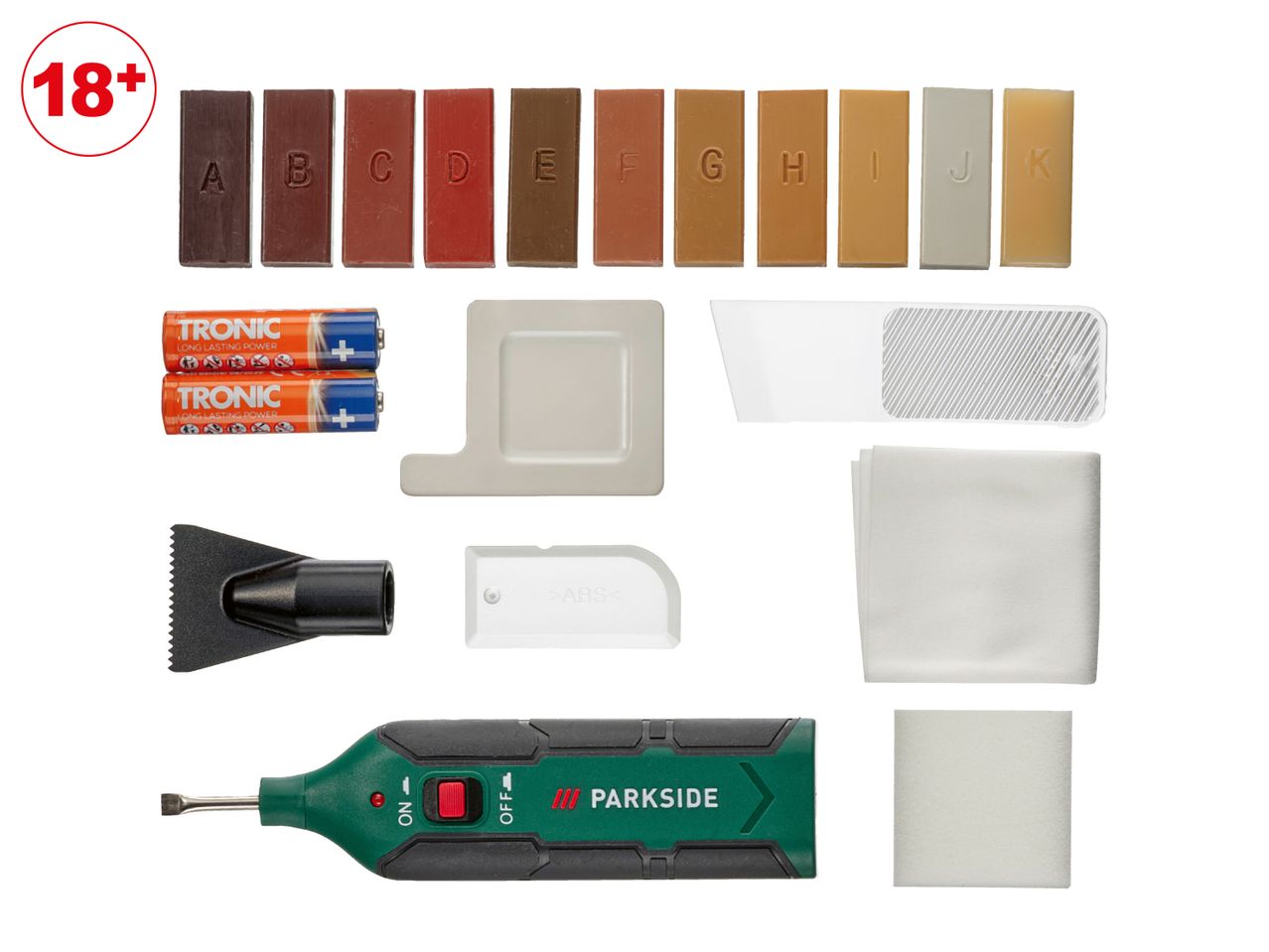 A wood repair kit with various colored wax sticks, batteries, tools, and cloths.
