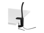 Black clamp-on desk lamp with a flexible neck, attached to a white desk.