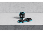 Two black and blue CRIVIT 1 kg ankle weights on a concrete surface.