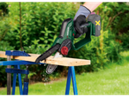 Parkside® 20 V cordless shrub cutter cutting a wooden board