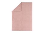 Soft pink fleece blanket with a folded corner