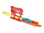 Hot Wheels launcher with a blue toy car on an orange track.