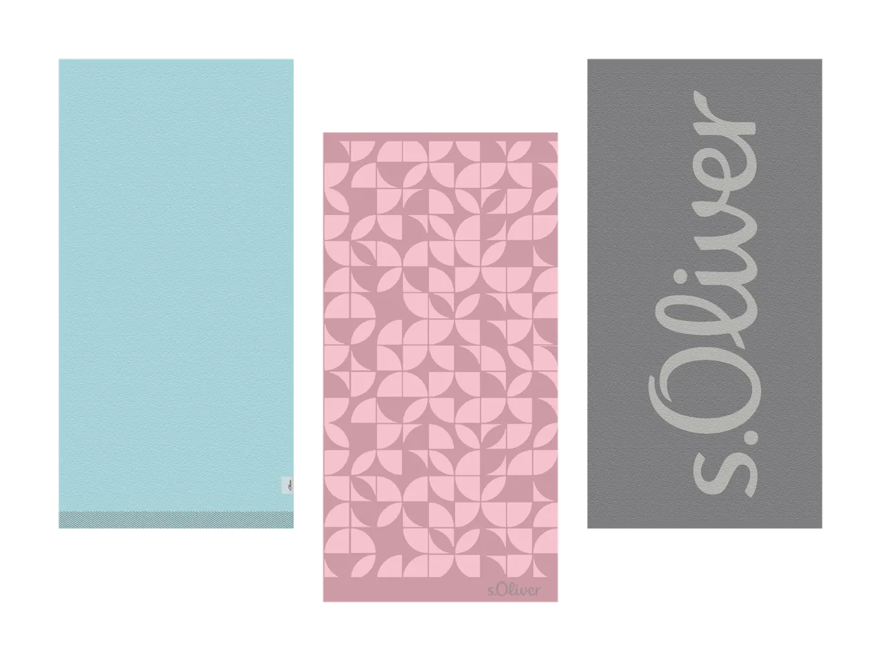 Trois serviettes: une bleu clair, une rose à motif géométrique et une grise avec lettrage.