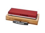 Parkside two-sided sharpening stone set with bamboo base and ceramic honing steel.