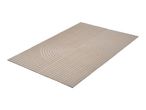 Beige textured rug with a modern carved geometric pattern