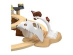 A dinosaur-themed wooden train set with a train, dinosaur figures, and a skull archway.