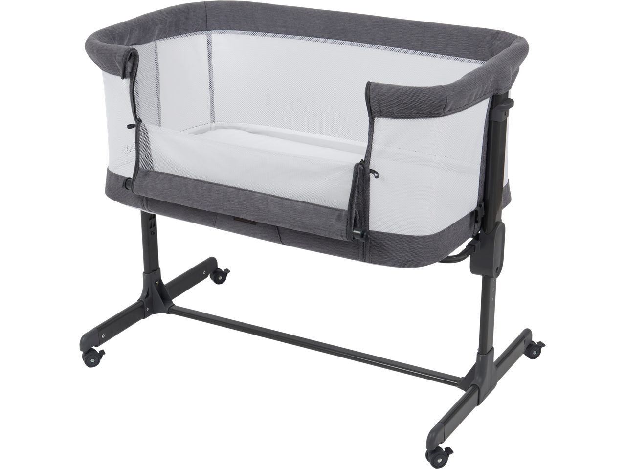 A grey baby bassinet with mesh sides and a white mattress on a dark grey stand with wheels.