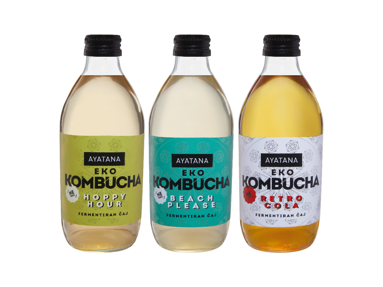 Tre bottiglie di kombucha Biotiful: Zenzero Limone, Pesca e Mela Rossa.