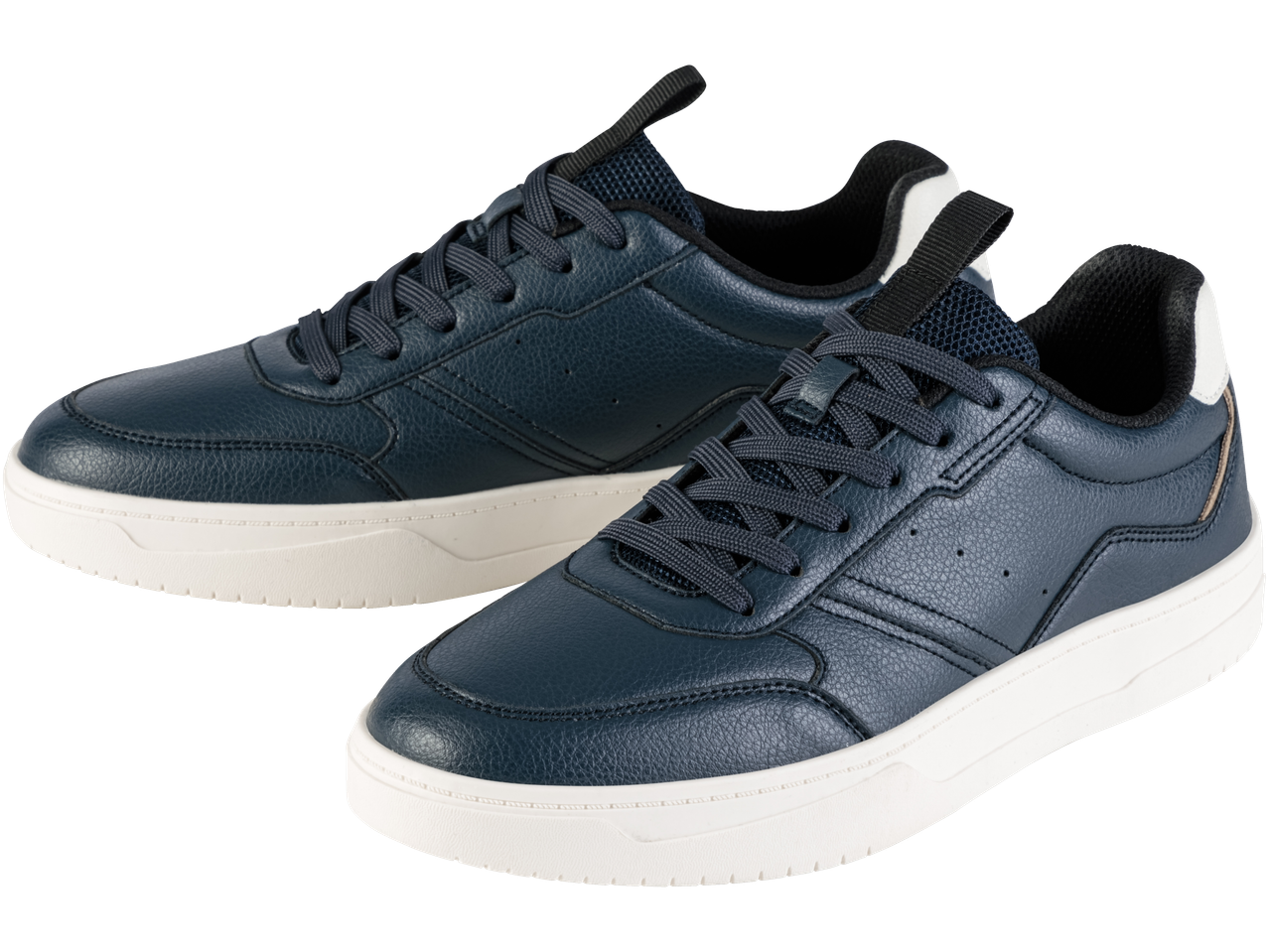 Kaks paari tumesiniseid tossusid valge tallaga.