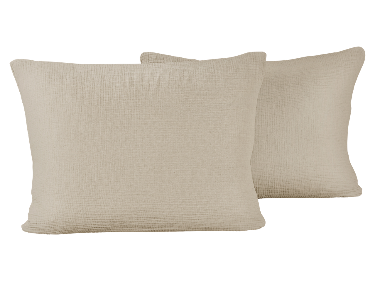 Két bézs színű, texturált anyagú díszpárna fekete háttér előtt.