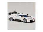 White toy race car with black accents and silver wheels on a light grey background.