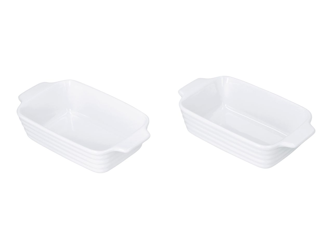 Two white rectangular ceramic baking dishes with ribbed sides and small handles.