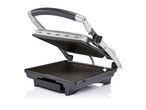 A silver and black contact grill with a carrying handle.
