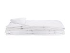 A neatly stacked set of white bedding, including a pillowcase and flat sheet.