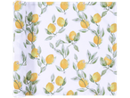 Rolled tablecloth with watercolor lemon design.