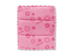 Ein Vileda-Spülschwamm in Rosa mit Blumenmuster.