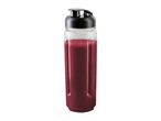 Clear blender bottle with a black lid, filled with a red smoothie.