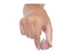 Hand holding a small, cute watermelon-shaped squishy toy with a bow.