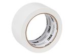A roll of white 3M tape with text on the inner core.