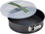 Zenker cake container with a springform pan and a clear lid with a green handle.