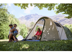 Family camping with CRIVIT tent, woman in a pink CRIVIT Ladies' Zip-Up Jacket.