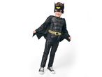 A young boy in a Batman costume with a cape and mask, smiling and looking to the side.