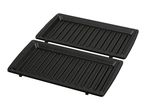 Open black grill plates for a sandwich maker or contact grill.