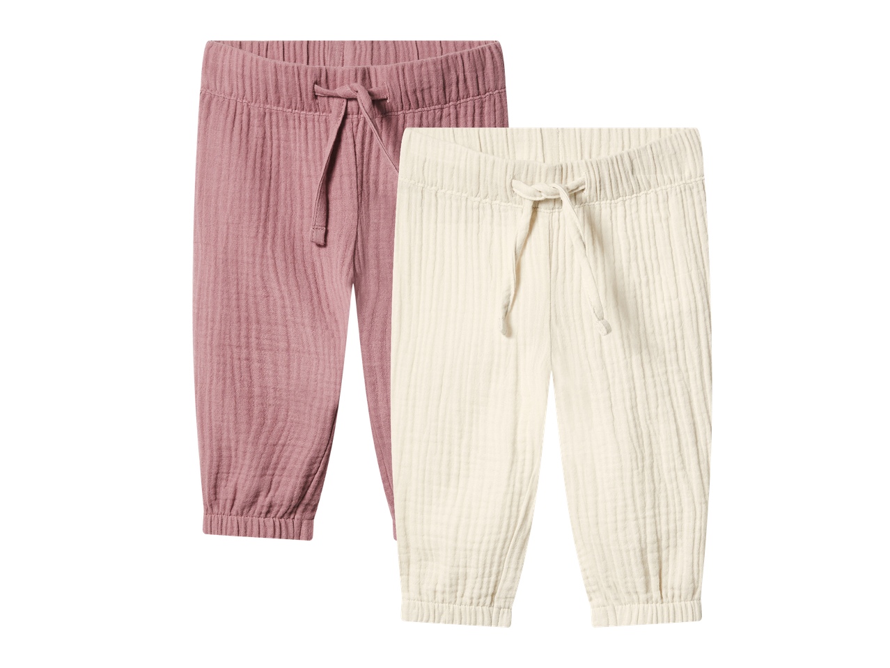 Dvoje dječjih hlača od muslina, jedne ružičaste i jedne bež boje.