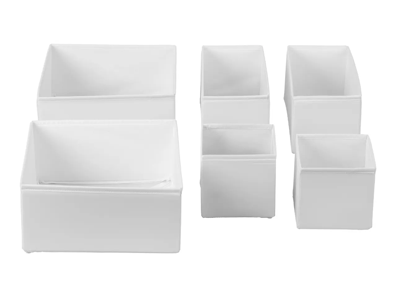 Set of white fabric storage boxes in various sizes for organizing items.
