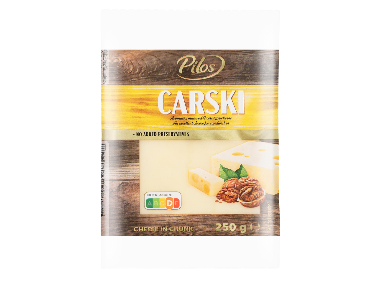 Svájci típusú sajt darabban, 250 g-os kiszerelésben, dióval és mentával díszítve.