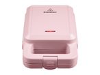 Pink SilverCrest waffle maker with a red indicator light