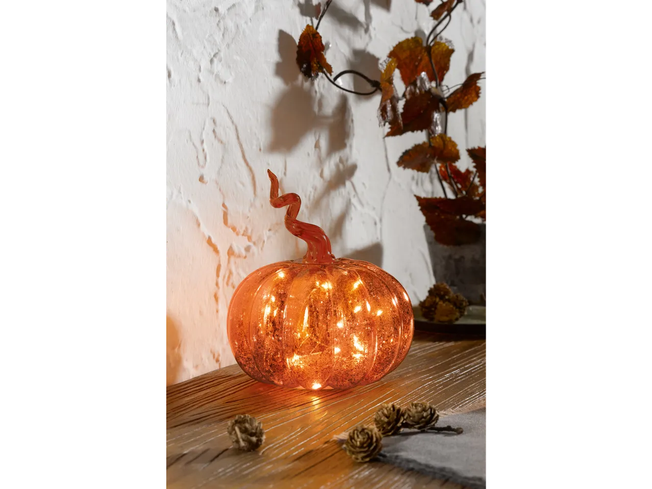 LIVARNO home Light-Up Decorative Pumpkin on a wooden surface with autumn decor