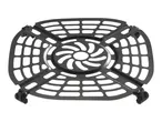 Black metal air fryer rack with a perforated design and rubber feet.