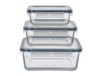 Three rectangular glass food storage containers with blue-grey lids, stacked vertically.