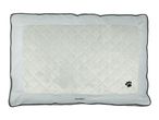 Light grey quilted pet bed with a black paw print and black piping.