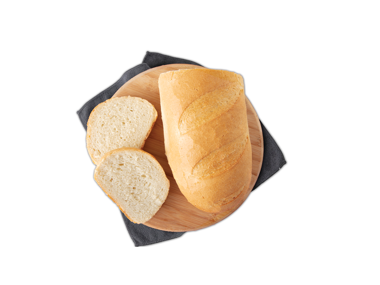 Svježi bijeli kruh i dvije kriške na drvenoj dasci za rezanje s tamnom krpom.