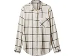 Camicia a quadri bianca e nera con maniche lunghe e taschino sul petto.
