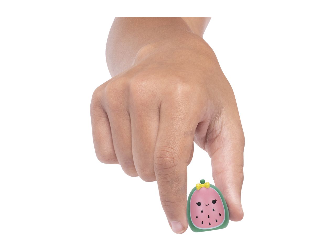 Hand holding a small, cute watermelon-shaped squishy toy with a bow.