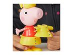 Child's hands holding a Peppa Pig toy with a removable yellow raincoat.