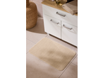 Livarno Home Bath Mat in beige, on a tiled bathroom floor next to a white vanity.