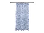 White shower curtain with a blue seashell pattern hanging on a silver rod