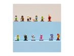 A collection of diverse minifigures, including a soccer player, chef, diver, zombie, and wizard.