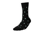 Black sock with a pattern of small green pine trees with snow on top