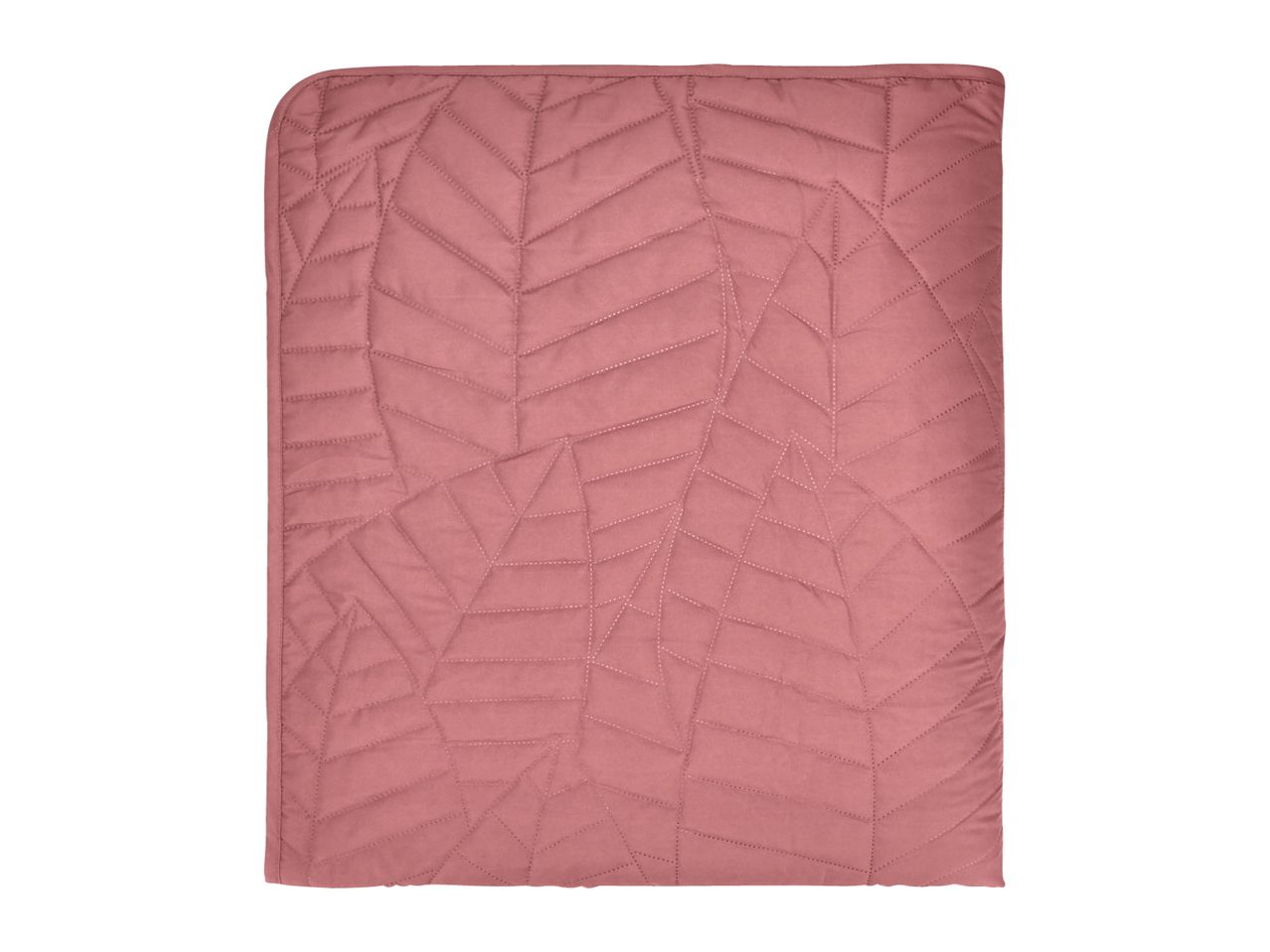 Pink quilted blanket with a geometric pattern.