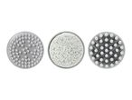 Three circular attachments for a foot care device: a brush, a pumice stone, and a massage head.